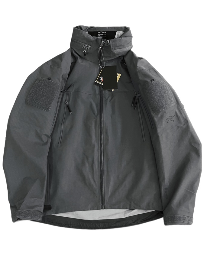Seller listing photo for Grey hardshell jacket