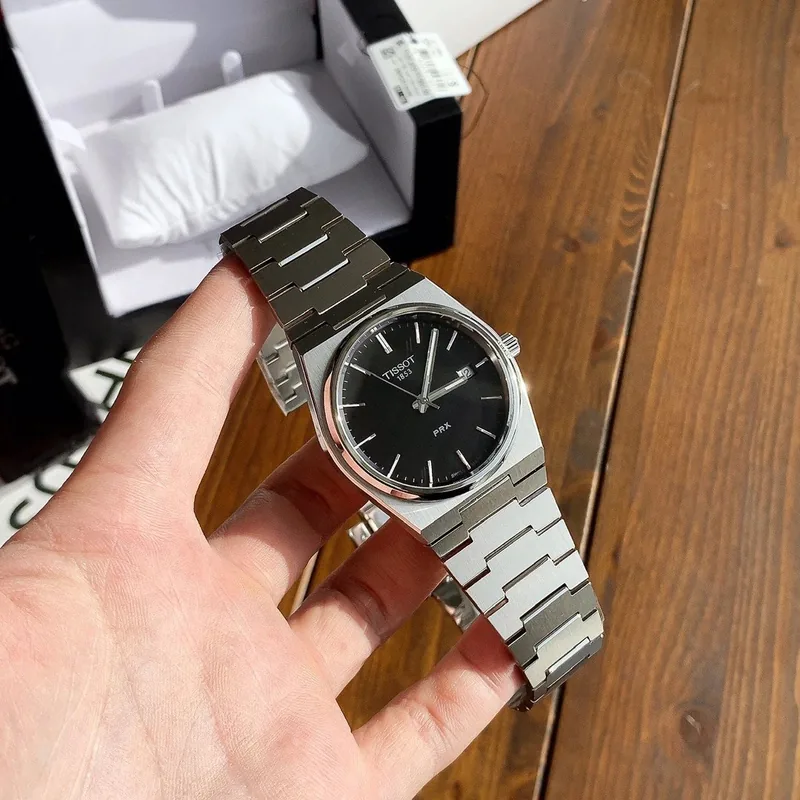 Seller listing image for PRX-style integrated watch · 40 mm